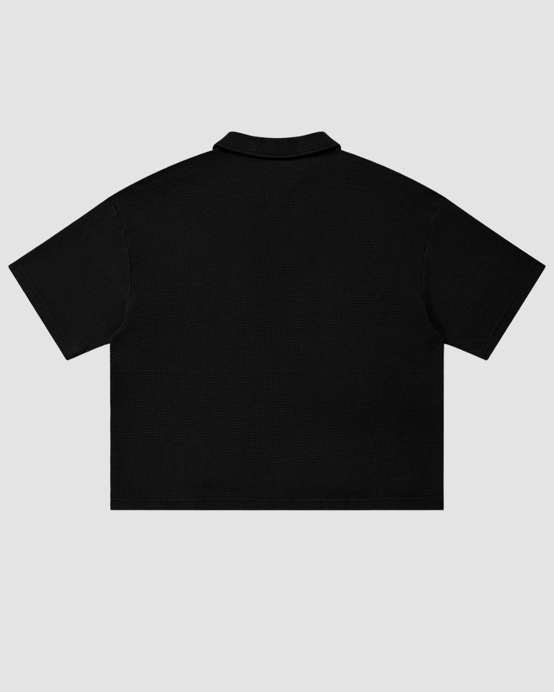 LE GAUFRÉ — polo boxy maille gaufrée wash vintage JALVÈNE, coloris Noir Encre